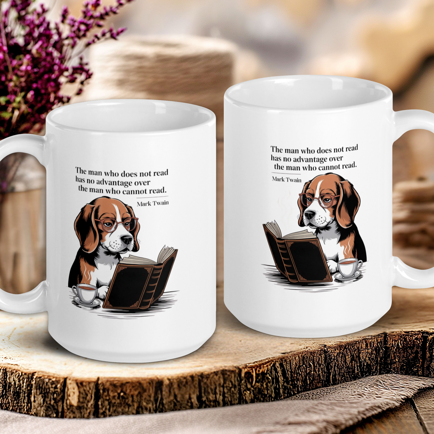 Two white mugs with a dog reading a book design and a quote on a wooden surface.
