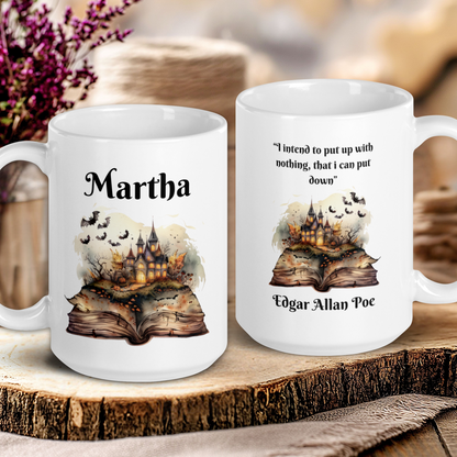 Two mugs with book-themed designs and text on a wooden surface.
