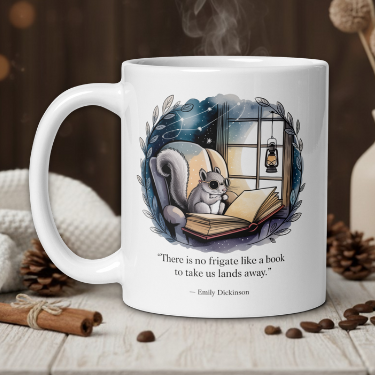 White mug with a squirrel illustration and book quote on a wooden table with coffee beans and a vase.