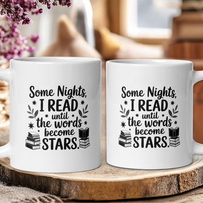 Two white mugs with a literary quote on a wooden surface.