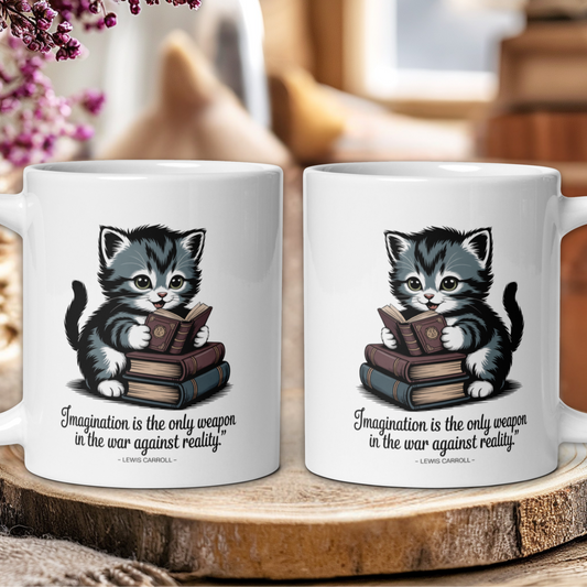 Two mugs with a kitten design and quote on a wooden surface.