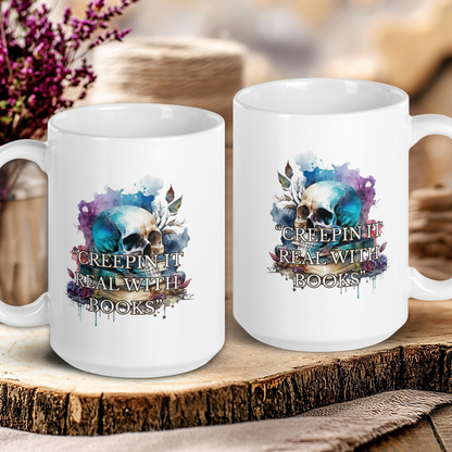 Two white mugs with artistic designs and text on a wooden surface.