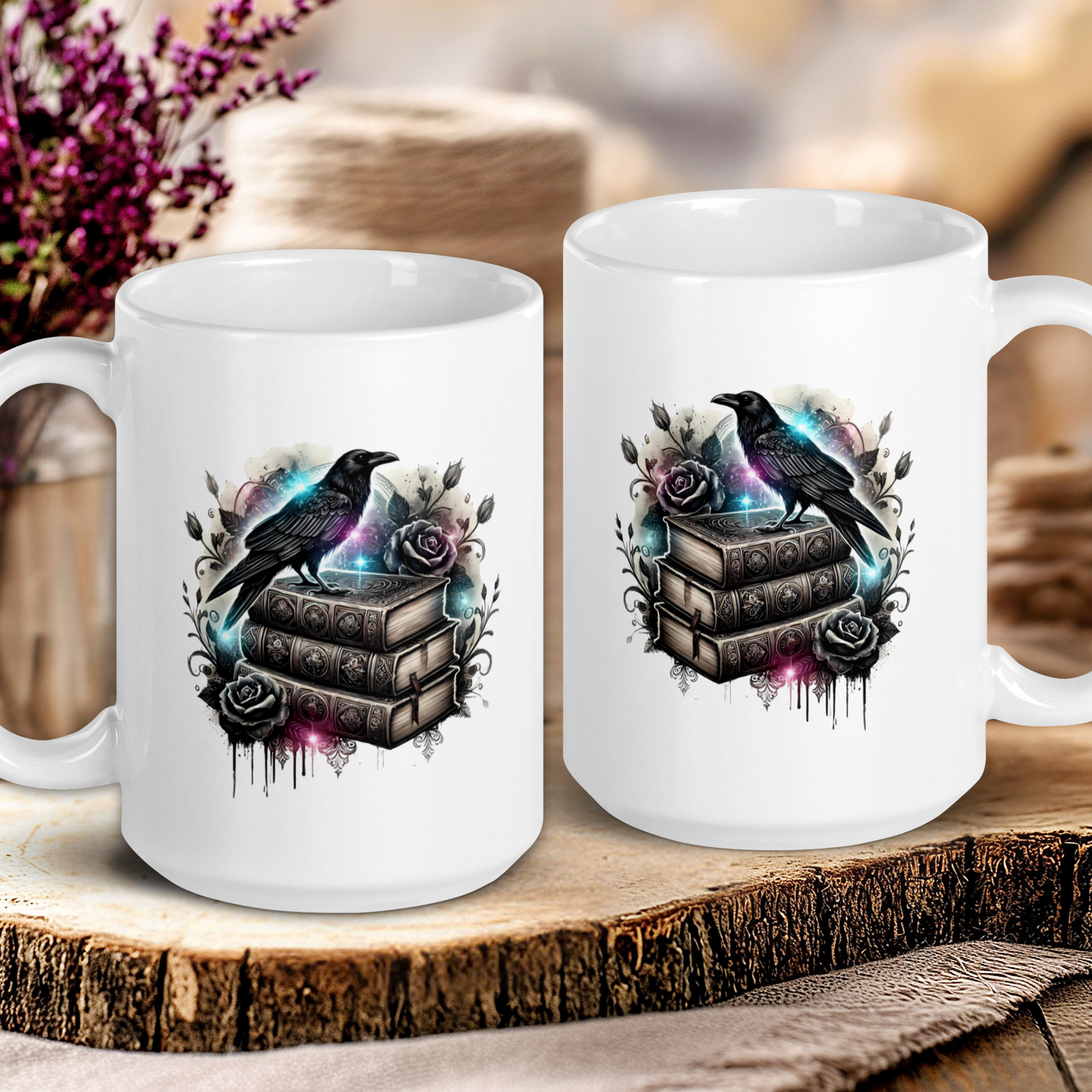 Two white mugs with artistic designs of books and birds on a wooden surface.